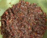 A picture of step 2 of Sfiha with Tomato and Tahini.