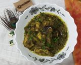 A picture of step 8 of Green Masala Chicken Curry.