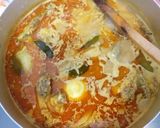 Foto langkah ke 3 dari resep Gulai Ayam & Telur Bumbu Instant Indofood.