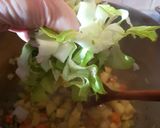 Foto del passaggio 2 della ricetta Zuppa densa di ceci e scarola