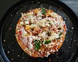 A picture of step 8 of Paneer Naan Pizza.