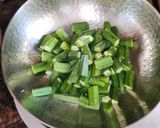 A picture of step 1 of Bhindi do pyaza.