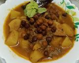 A picture of step 8 of Desi Spiced Chickpeas and Potatoes.