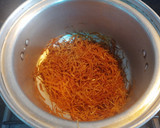 Foto del paso 1 de la receta: Arroz con fideos, Cola-Cola y uvas pasas