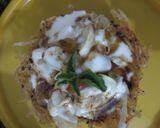 A picture of step 8 of Lacha potato katori loaded with grains.