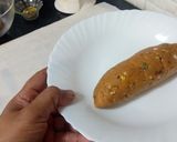 A picture of step 6 of Biscuits Meethi (Swiss roll style).
