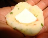 Foto del paso 7 de la receta: Papas duquesas con jamón serrano y queso mozzarella