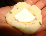 Foto del paso 7 de la receta: Papas duquesas con jamón serrano y queso mozzarella