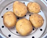 A picture of step 1 of Crispy Cheese-Stuffed Aloo Corn Paneer Mexican Fusion Bombs 🧀🥔🌽 | Street-Style Fusion Snack.