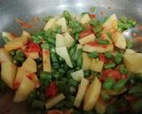 A picture of step 4 of Beans & Potato Pulao.