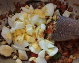 A picture of step 5 of Egg masala.