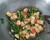 Foto langkah ke 6 dari resep Tumis Tahu Bayam.