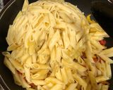 A picture of step 7 of Mac and bell peppers stir fry.