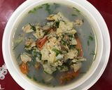 Hình bước làm 3 của món Canh nghêu khế cà chua thì là