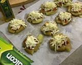 A picture of step 5 of Smashed Pizza Potatoes.