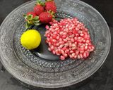 A picture of step 1 of Strawberry pomegranate Mojito.