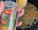 Une image de l'étape 3 de Dahl de lentilles corail au lait de coco.
