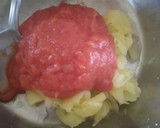 Foto del paso 2 de la receta: Calabacín bolita relleno de atún al microondas