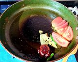 A picture of step 4 of Niramish Macher Jhol.