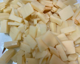 Foto del paso 4 de la receta: Calabacín relleno de pisto con queso emmental