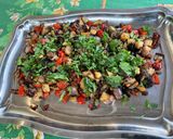 Une image de l'étape 16 de Aubergine et poivron aux tomates confites, coriandre et épices.