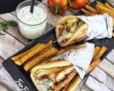 صورة لخطوة 12 من وصفة ساندوتشات شاورما الدجاج اليونانية Gyro 🇬🇷