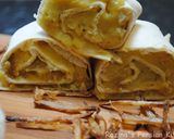 A picture of step 16 of Persian mashed potato wrap.