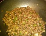 A picture of step 6 of Homemade pizza with minced beef and cheese topping.