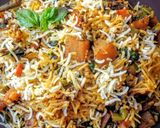 A picture of step 6 of Hyderabadi dum biryani.