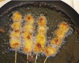 A picture of step 7 of Chicken Fried Sticks.