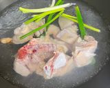 A picture of step 1 of Chicken Soup with Preserved Winter Melon, Shiitake Mushrooms, and Bamboo Shoots.