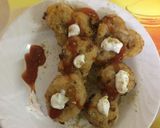 A picture of step 3 of Arancini with cheesy corn and mayo.