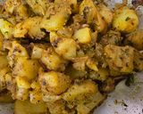 A picture of step 3 of Achari alu kadi rice.