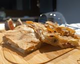 Foto del passaggio 5 della ricetta Focaccia sarda al carasau🍷