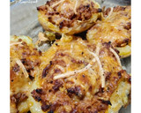 Foto del paso 8 de la receta: Patatas rellenas de carne y patitas de calamar