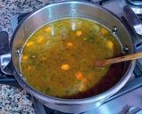 Foto del paso 10 de la receta Garbanzos y langostinos con reducción de las cabezas
