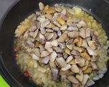 Foto del paso 3 de la receta: Tellinas, con cebolla caramelizada y sake