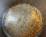 A picture of step 1 of Vegetable loaded dal kichadi.