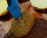 A picture of step 3 of "loaded" stuffed potato skins.