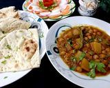 A picture of step 4 of Chana Aalu ka salan and Roti.