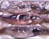 A picture of step 1 of Ikameshi (Stuffed Squid with Tentacles).