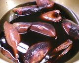 A picture of step 3 of Ikameshi (Stuffed Squid with Tentacles).