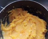 A picture of step 10 of Matumbo in coconut cream and mashed pumpkin.