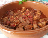 Foto del paso 5 de la receta: Cerdo en salsa con pimientos del piquillo