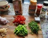 A picture of step 2 of Garlic Brown Bread mix vegetables cheese mini bread pizza.