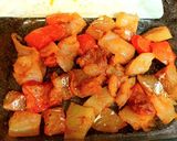 A picture of step 2 of Fish mix with sweet peppers in white sauce.