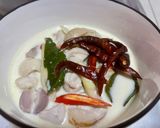 A picture of step 5 of Tom Kha Gai (Thai Coconut Chicken Soup).