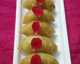 A picture of step 26 of Gujiya (Moong daal khoya and nariyal stuffed).