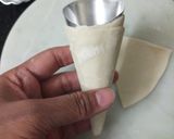 A picture of step 5 of Sweet chana dal cone.