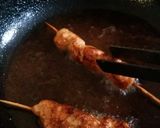 A picture of step 3 of Orange Chicken skewers.